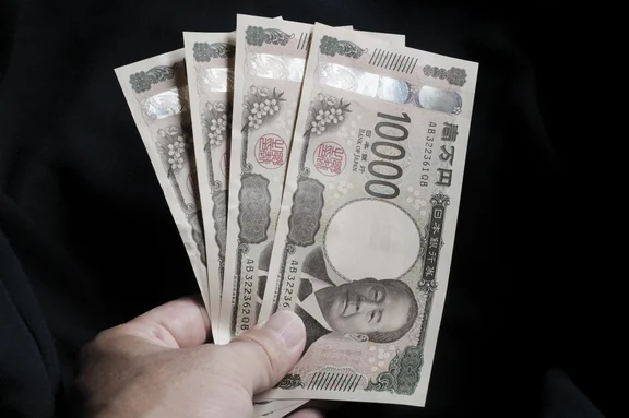 Yen Fluctuates After Bank Of Japan Hikes Rates As Traders Wait For Governor Speech Bloomberg News NDTV Profit